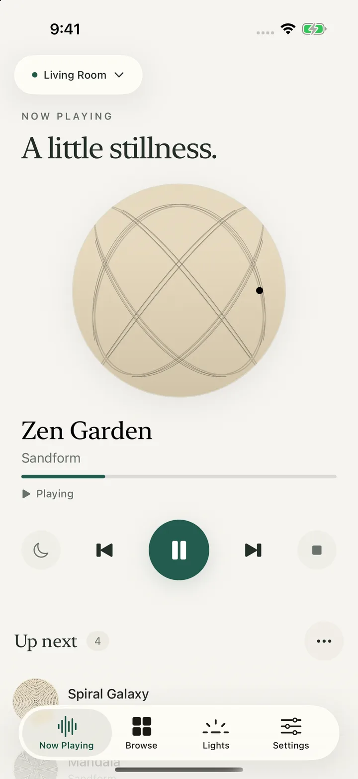 The redesigned Sandform Now Playing screen in warm ivory, with Zen Garden, playback progress and queue controls